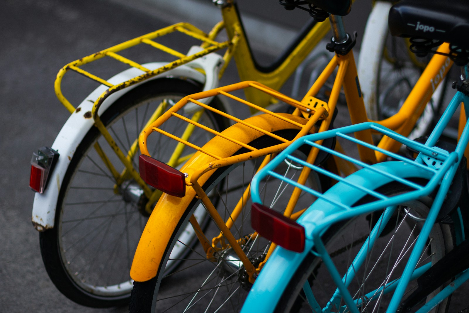 yellow and red bicycle on road