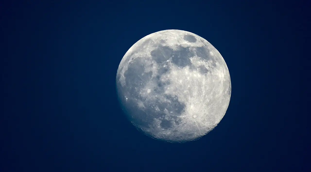 full moon on blue background