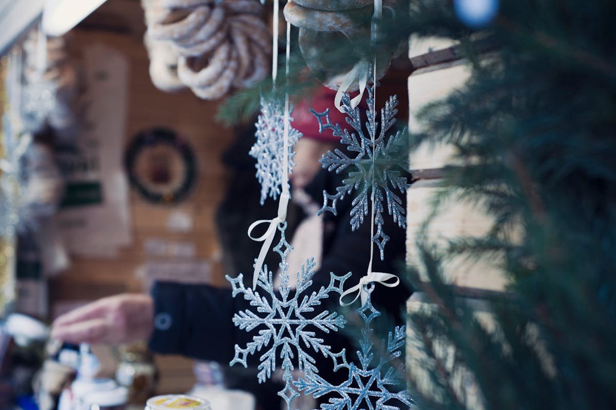 Shallow Focus Photography of Snowflakes Christmas Tree Decor